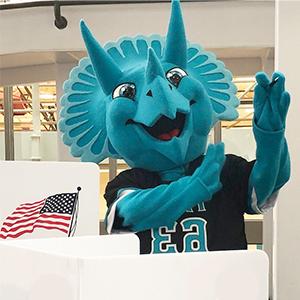 Stomp the mascot encourages you to vote!